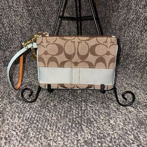 Coach Brown Signature Canvas Wristlet with Light Blue Accent